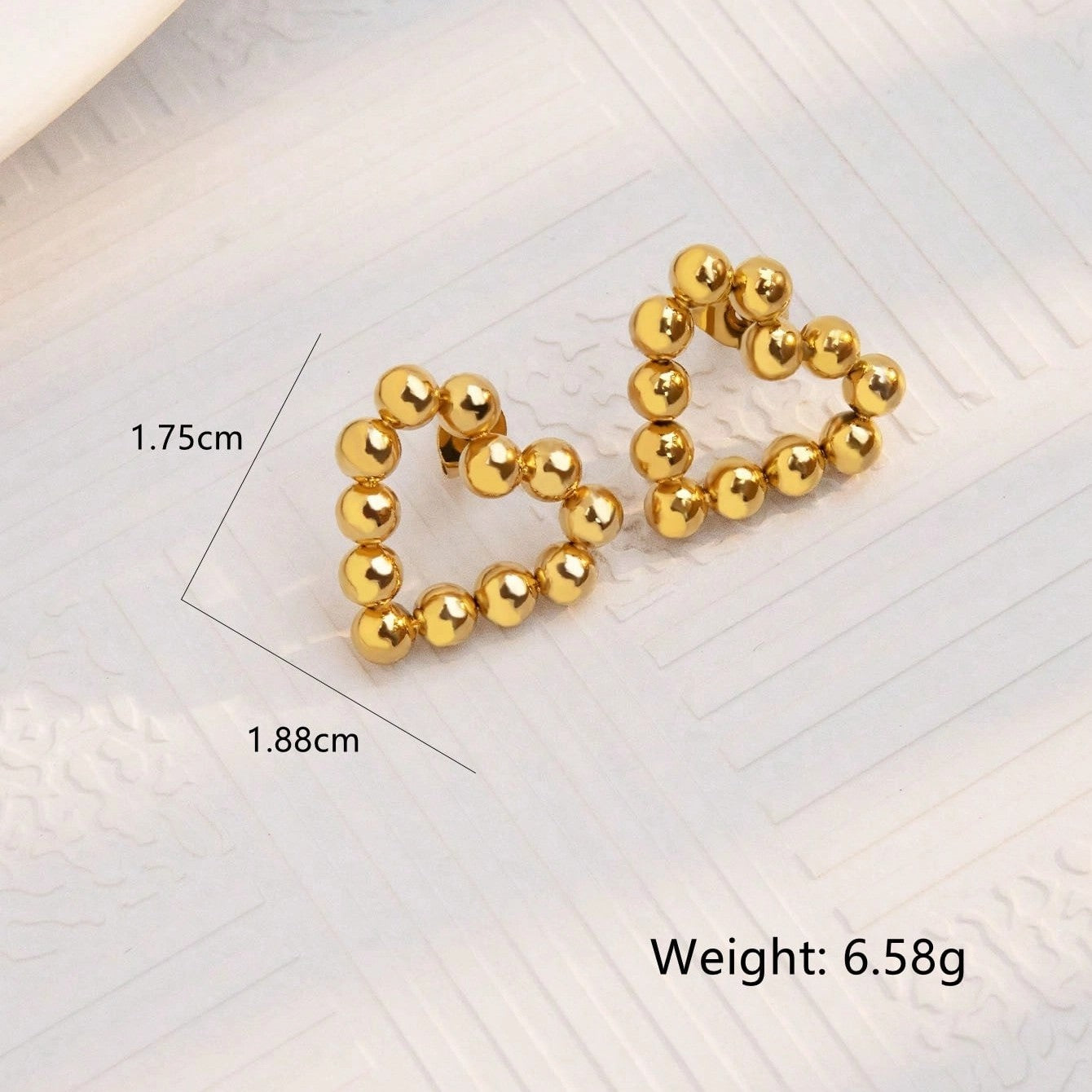 ARETES CON PUNTITOS DORADOS