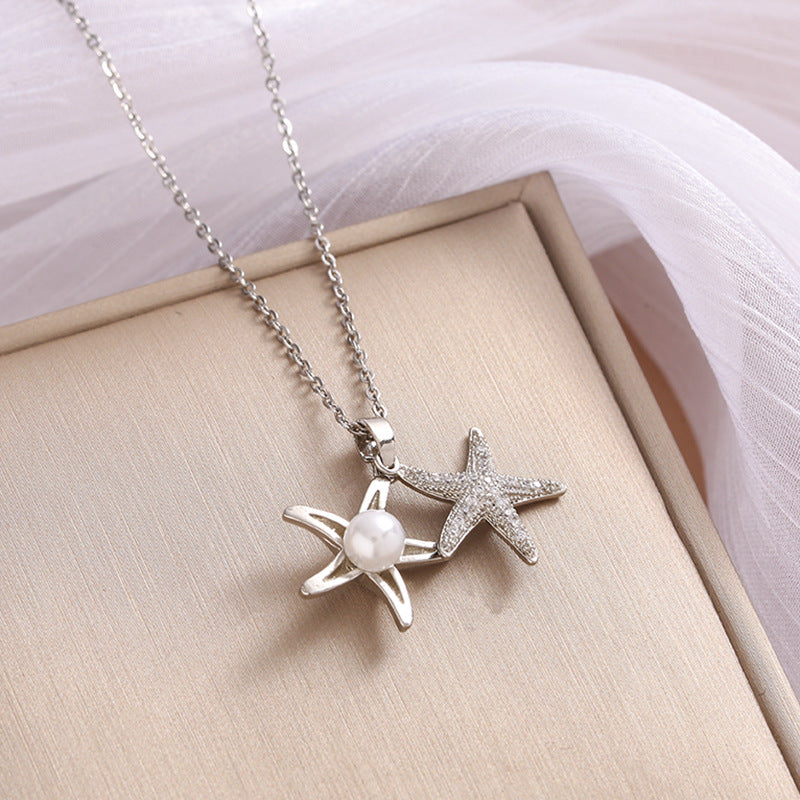 COLLAR RELICARIO DE ESTRELLA CON PERLA