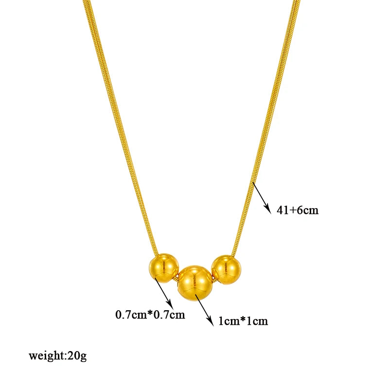 COLLAR DOBLE CON TRES BOLAS