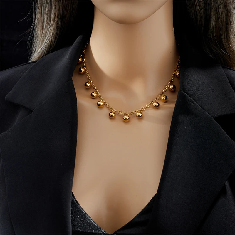 COLLAR CON BOLITAS DORADAS