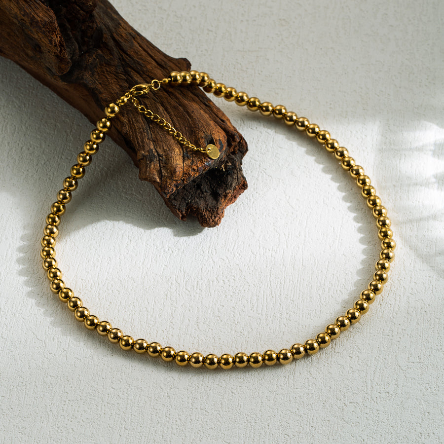 COLLAR DE CUENTAS DE PUNTITOS