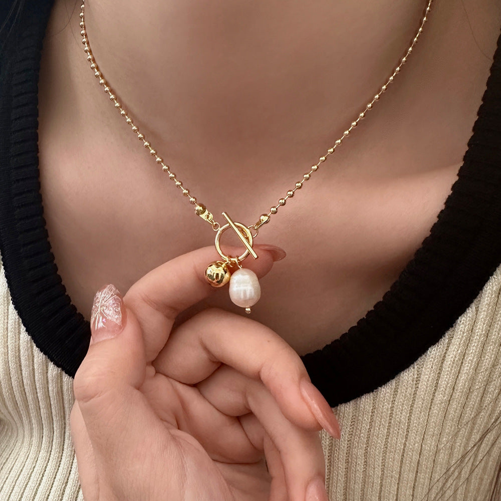 COLLAR DE BOLITAS CON DIJE DE PERLA INFERIOR