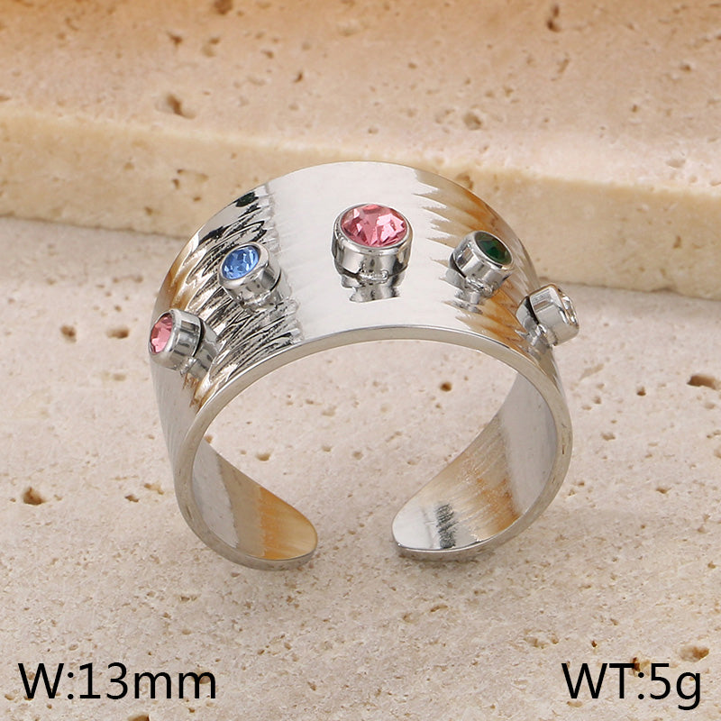 ANILLO PLATEADO CON PIEDRAS DE COLORES