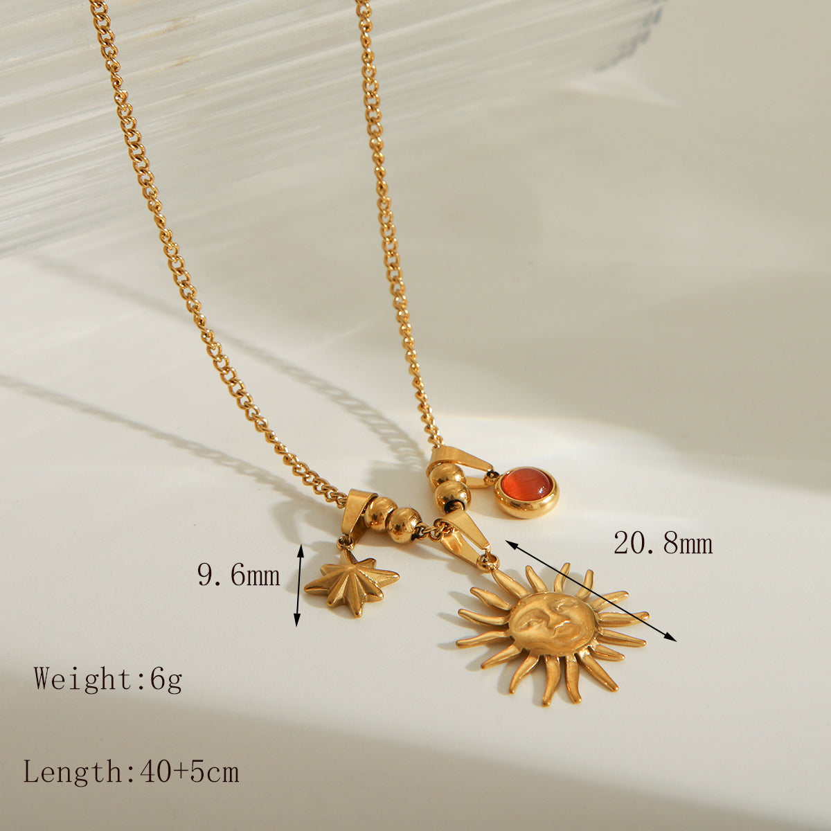 COLLAR CON DIJES COLGANTES