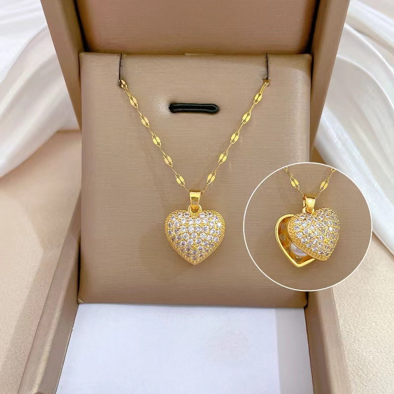 COLLAR CON RELICARIO CON PERLA INTERIOR