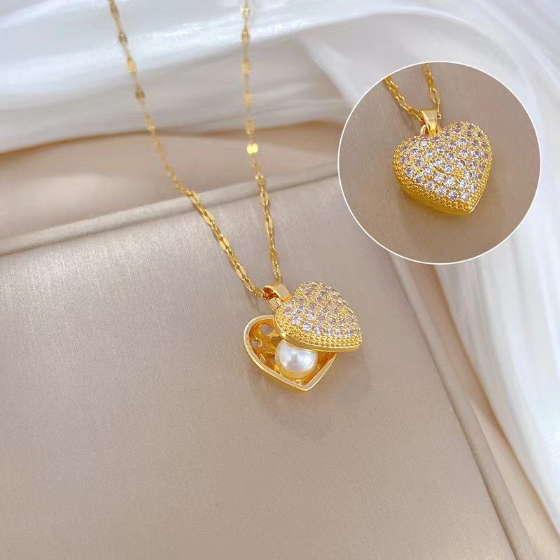 COLLAR CON RELICARIO CON PERLA INTERIOR
