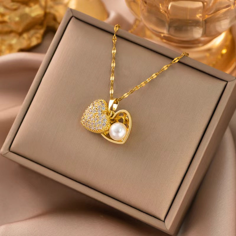 COLLAR CON RELICARIO CON PERLA INTERIOR