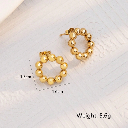 ARETES CON PUNTITOS DORADOS