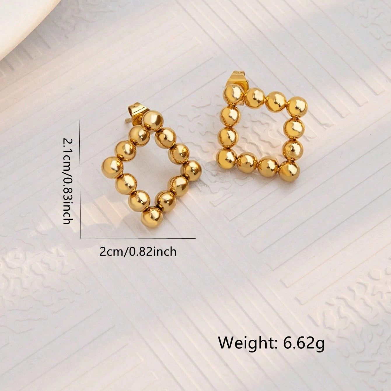 ARETES CON PUNTITOS DORADOS