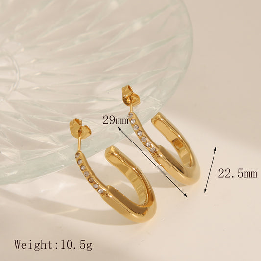 Aretes arracada en c dorado con circonias