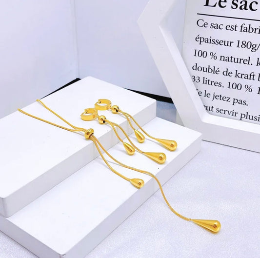 SET CORBATIN DORADO CON ARETES