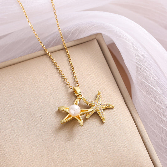 COLLAR RELICARIO DE ESTRELLA CON PERLA