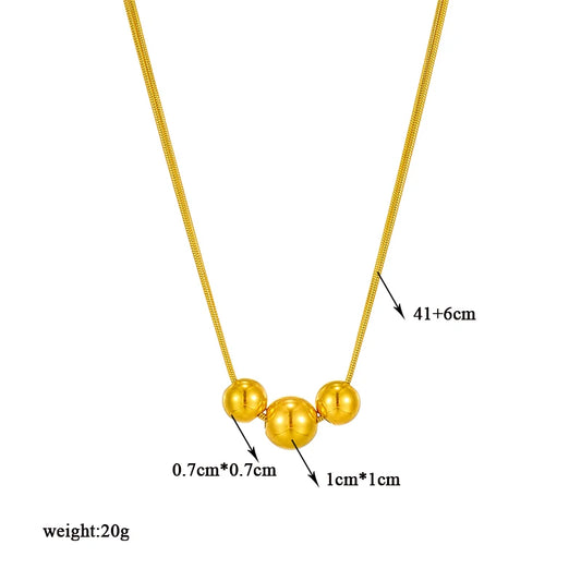 COLLAR DOBLE CON TRES BOLAS
