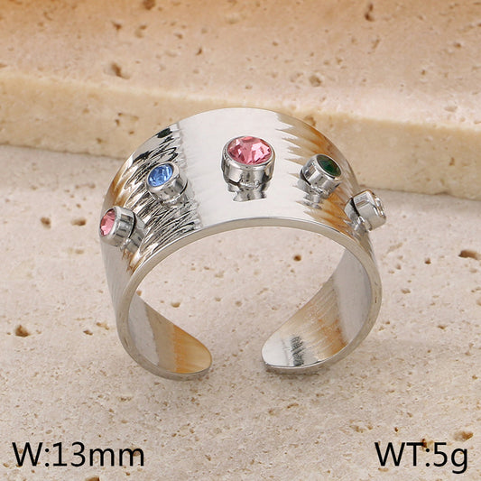 ANILLO PLATEADO CON PIEDRAS DE COLORES
