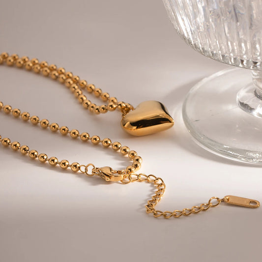 COLLAR DE PUNTITOS CON CORAZON CHICO