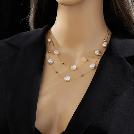 COLLAR DOBLE DORADO CON PERLAS DE RIO