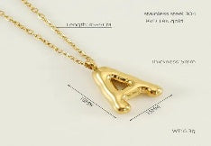 COLLAR DORADO C/LETRA A GLOBO